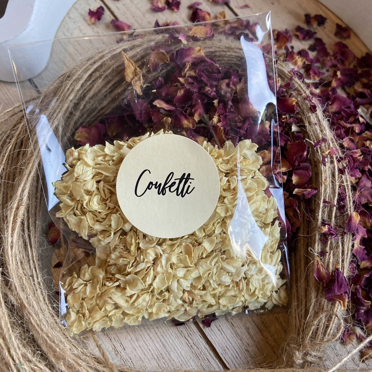 Pre filled natural petal confetti packets or loose petal confetti, whi